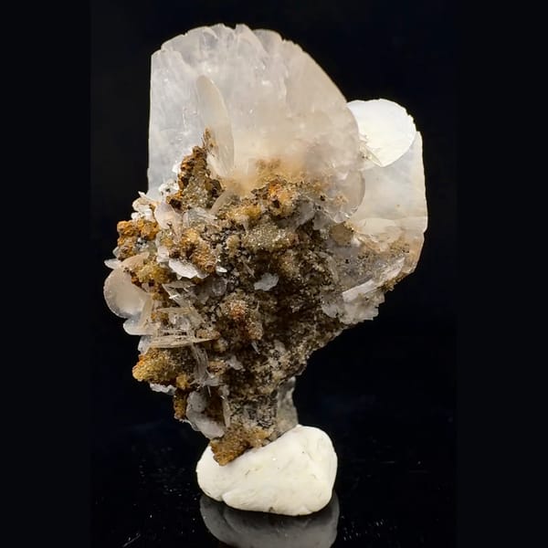 Translucent fan-shaped calcite blades on brown crystals from Fujian — detail view