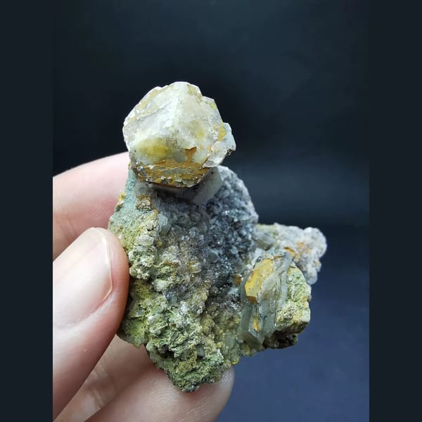 Mercedes-head calcite on matrix — complete view