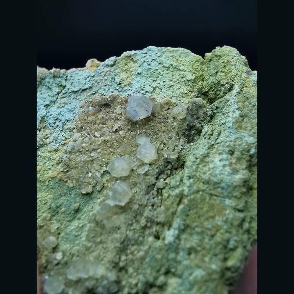 Mercedes-head calcite on matrix — detail view