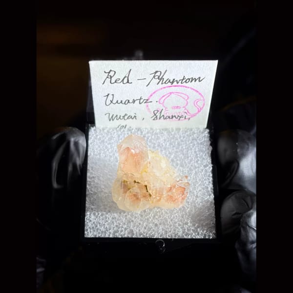 Red phantom quartz cluster from Wutai, Shanxi — alternate view