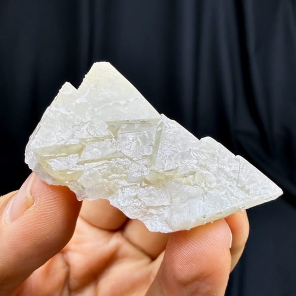 Translucent white twinned scheelite crystal from Yaogangxian, Hunan — complete view