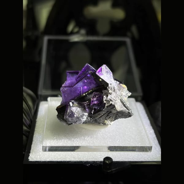 Royal purple fluorite on wolframite from Yaogangxian — complete view