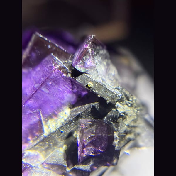 Royal purple fluorite on wolframite from Yaogangxian — detail view