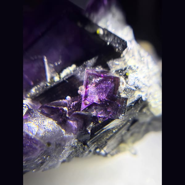 Royal purple fluorite on wolframite from Yaogangxian — detail view