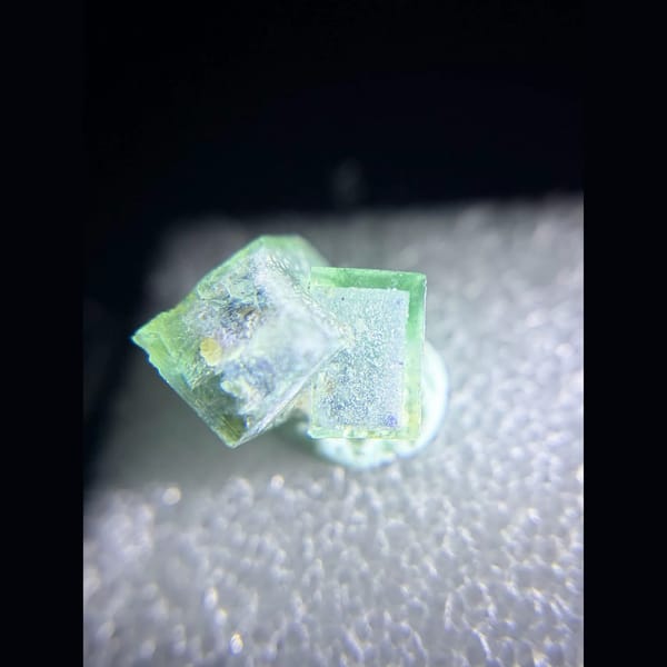 Apple-green porcelain fluorite twin from Yindu — alternate view