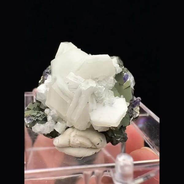 Small white blocky calcite with purple fluorite from Fujian — complete view