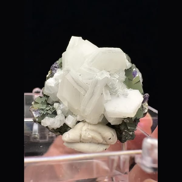 Small white blocky calcite with purple fluorite from Fujian — alternate view