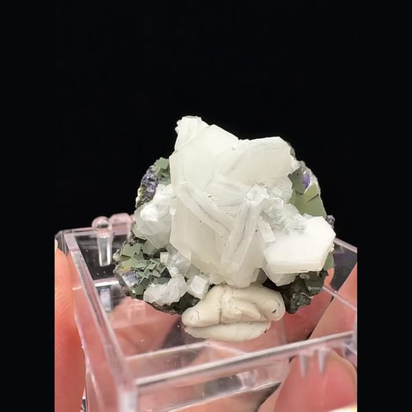 Small white blocky calcite with purple fluorite from Fujian — alternate view