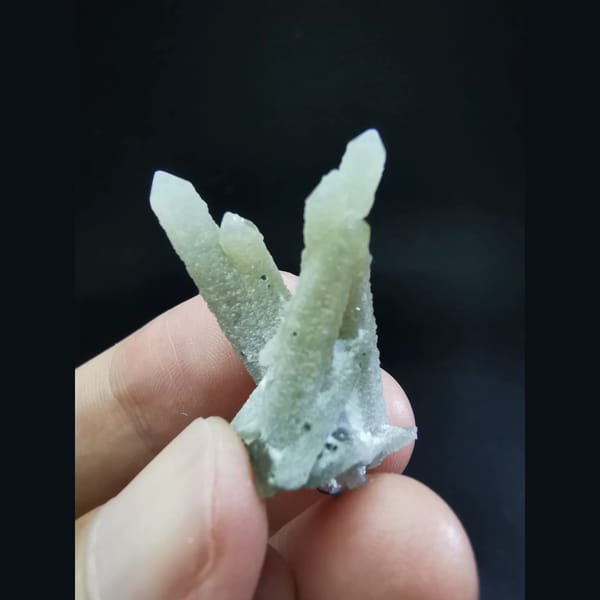 Pale green quartz crystal cluster — complete view