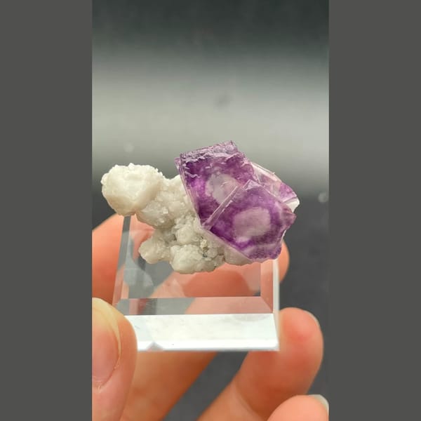 Alien eye purple fluorite with candle quartz from Inner Mongolia — complete view