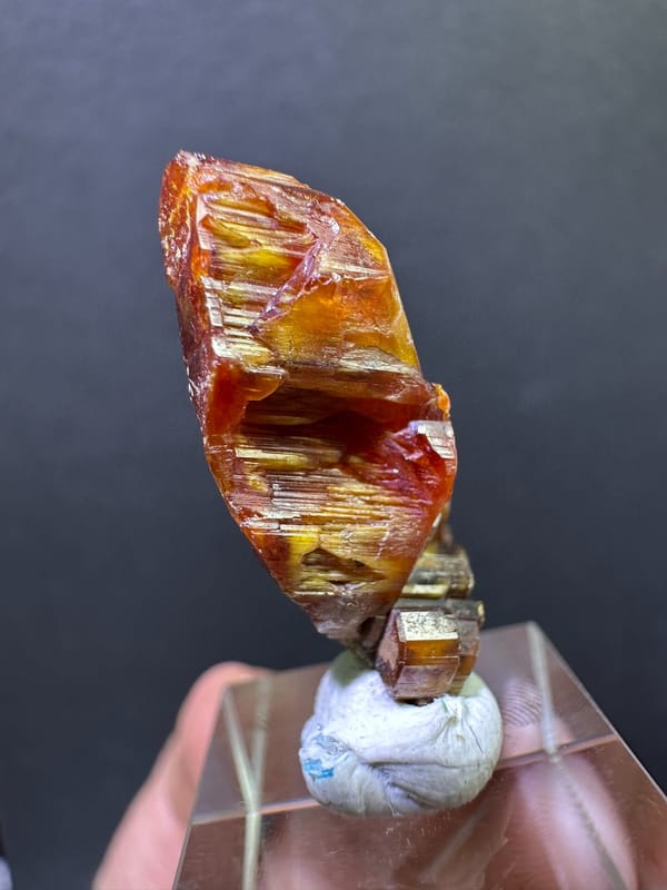 Opposite edge view of the Moroccan vanadinite crystal group