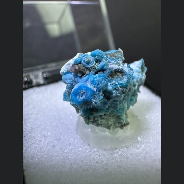 Bright blue gibbsite with ring patterns from Yunnan — alternate view