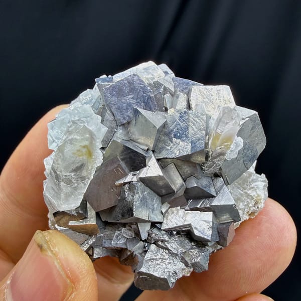 Complete reverse-facing view of arsenopyrite with quartz, fluorite and mica