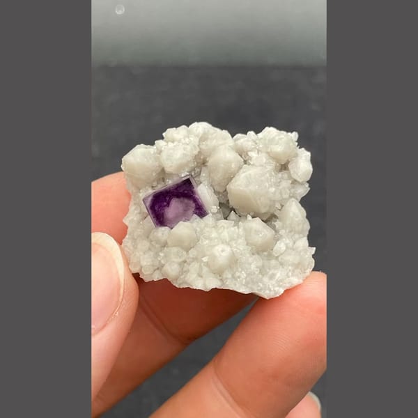 Purple fluorite nested in white quartz from Inner Mongolia — complete view