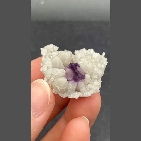 Purple fluorite nested in white quartz from Inner Mongolia — alternate view