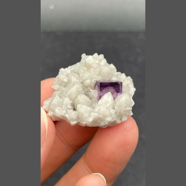 Purple fluorite nested in white quartz from Inner Mongolia — alternate view