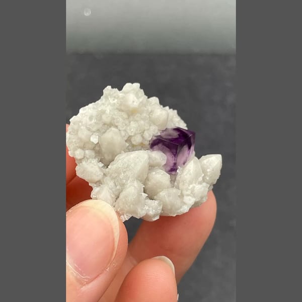 Purple fluorite nested in white quartz from Inner Mongolia — detail view