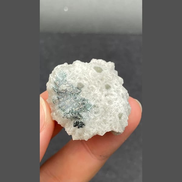 Purple fluorite nested in white quartz from Inner Mongolia — detail view