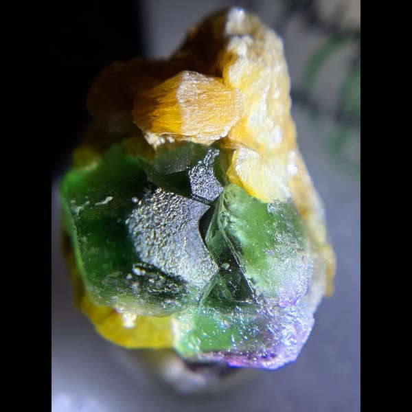 Emerald-green fluorite with muscovite from Erongo, Namibia — detail view