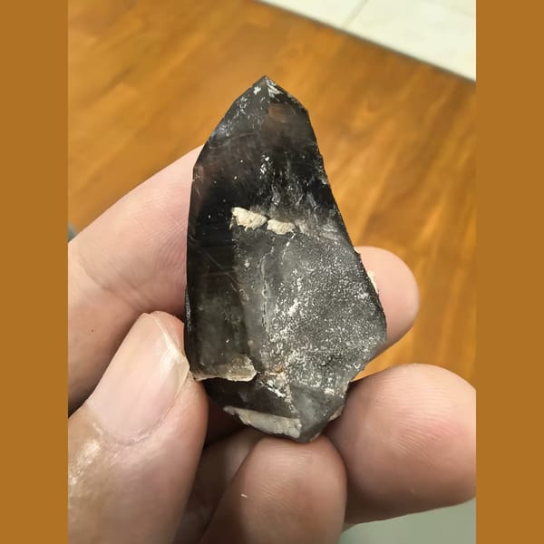Smoky quartz point with green epidote and feldspar — alternate view