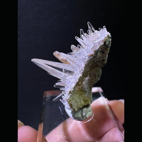 Spiky dogtooth calcite on green matrix from Pakistan — complete view