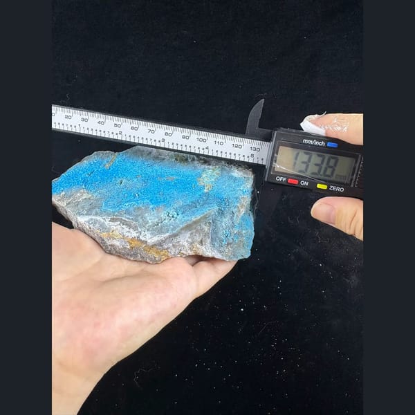 Large fluorescent blue gibbsite and allophane plate from Qinglong — alternate view