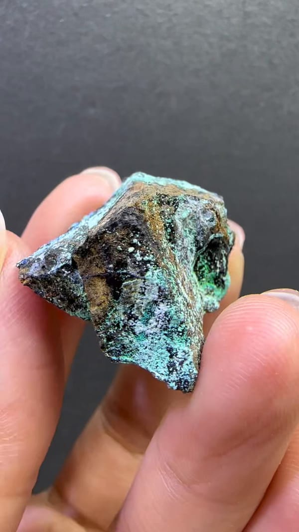 Complete side view of the exact azurite, malachite and gibbsite specimen
