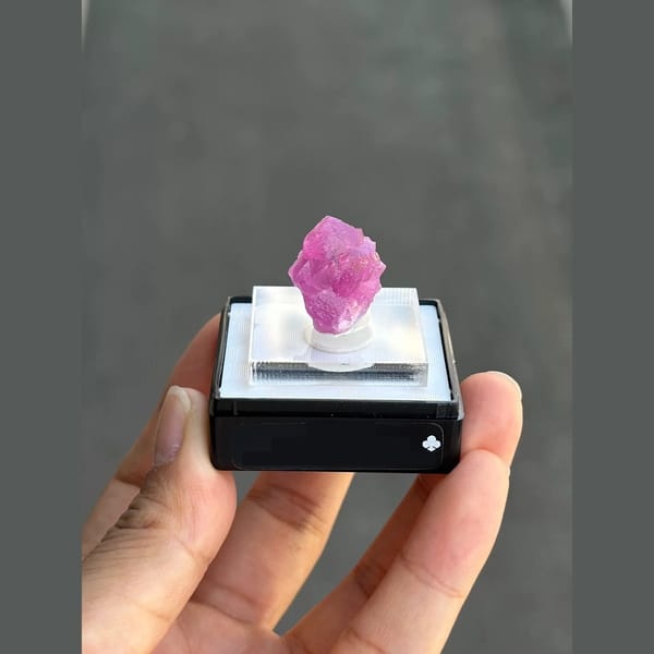 Vivid magenta cobaltoan calcite crystal from Morocco — complete view