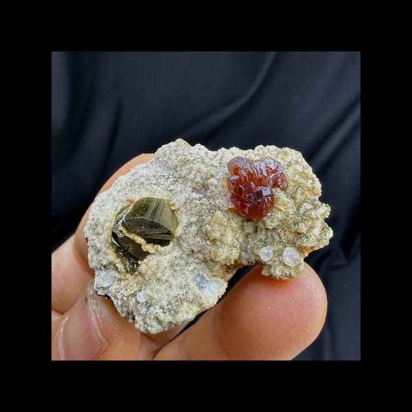 Complete crystal face of sphalerite pyrite fluorite and dolomite