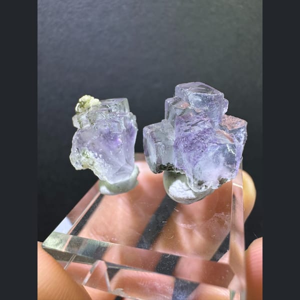 Two lavender Yaogangxian fluorite specimens — complete view