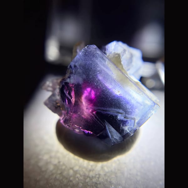 Clear fluorite with magenta phantom core from Yindu — complete view