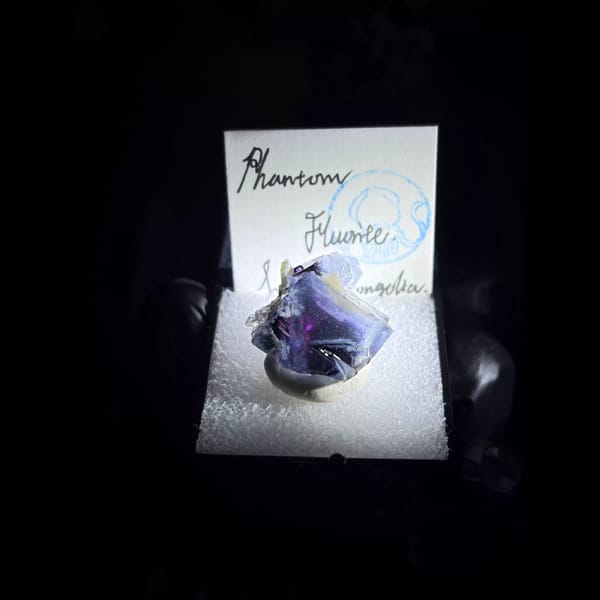 Clear fluorite with magenta phantom core from Yindu — alternate view