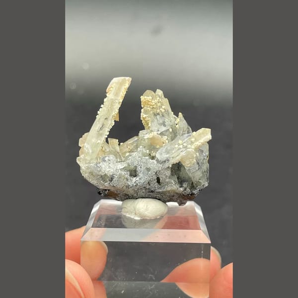Fluorescent calcite with quartz from Bulgaria — detail view