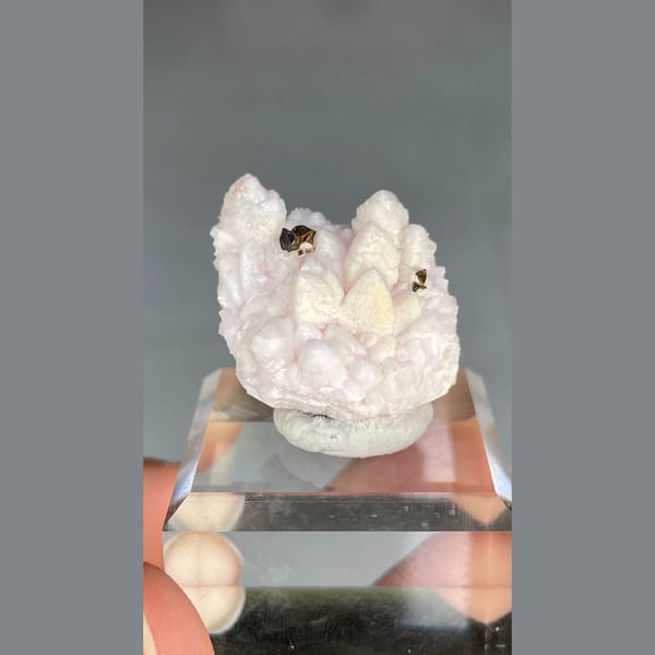 Pale pink manganoan calcite with chalcopyrite from Bulgaria — complete view