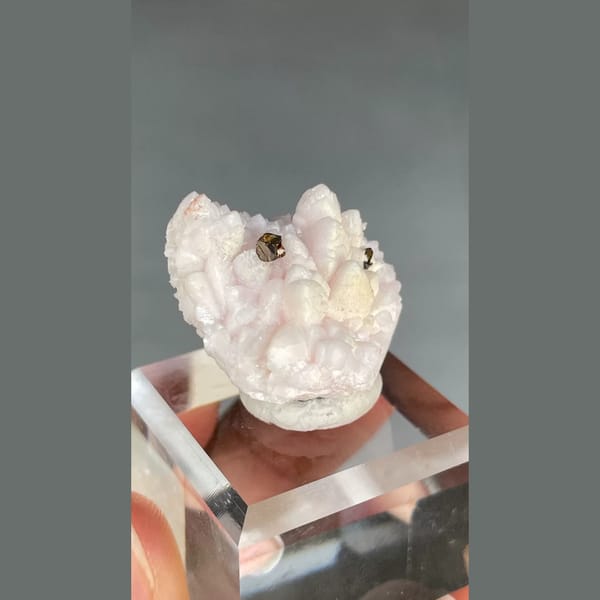 Pale pink manganoan calcite with chalcopyrite from Bulgaria — alternate view
