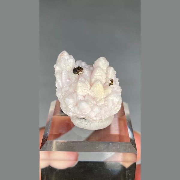 Pale pink manganoan calcite with chalcopyrite from Bulgaria — alternate view