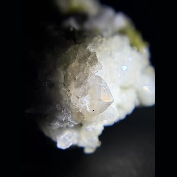 Epidote with chabazite and stilbite from Luoyuan, Fujian — detail view