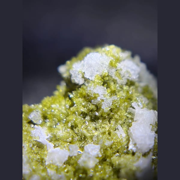 Epidote with chabazite and stilbite from Luoyuan, Fujian — detail view