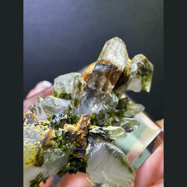 Clear quartz with olive epidote from Sichuan — alternate view