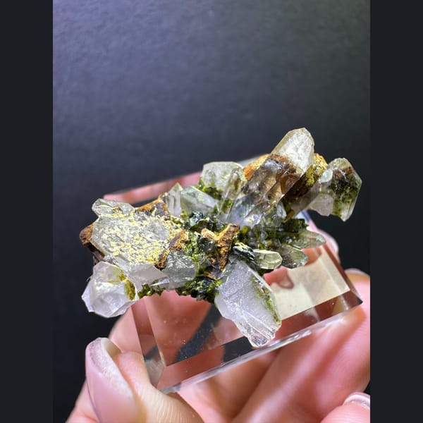 Clear quartz with olive epidote from Sichuan — alternate view