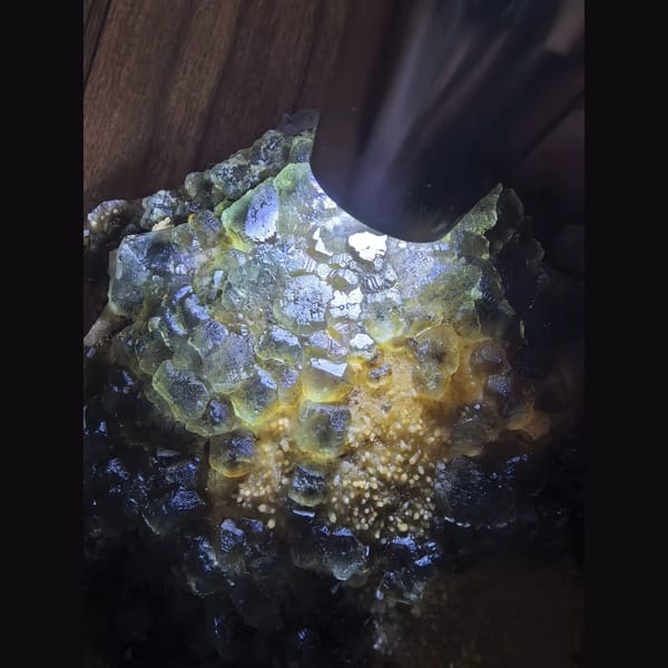Large blue-green fluorite on calcite matrix — detail view