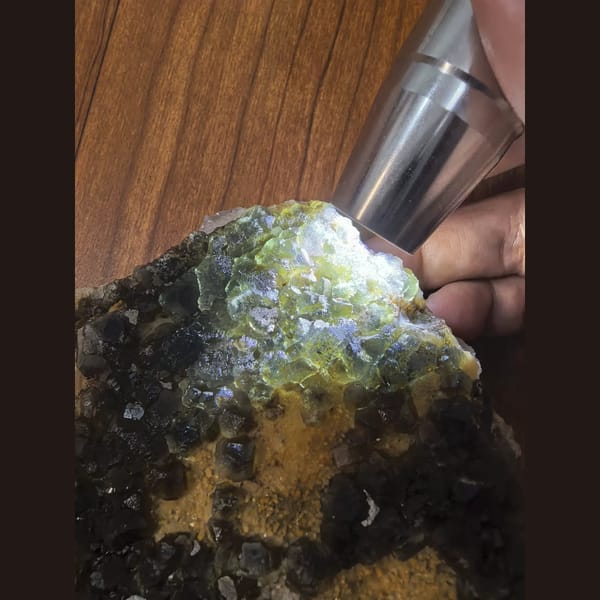 Large blue-green fluorite on calcite matrix — detail view