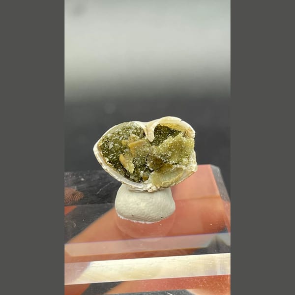 Small olive-green anapaite crystal ball from Yunnan — alternate view