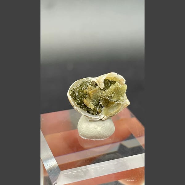 Small olive-green anapaite crystal ball from Yunnan — alternate view