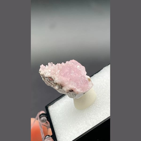 Pale pink sparkling cobaltoan calcite crust from Morocco — alternate view