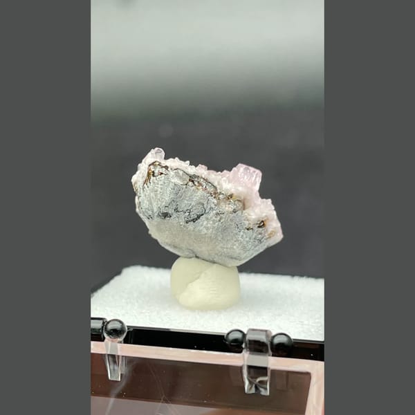 Pale pink sparkling cobaltoan calcite crust from Morocco — detail view