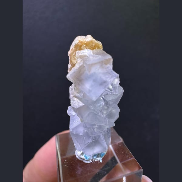 Pale blue fluorite column with tan calcite from Yunnan — alternate view