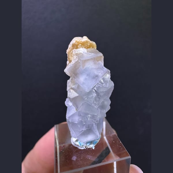 Pale blue fluorite column with tan calcite from Yunnan — detail view