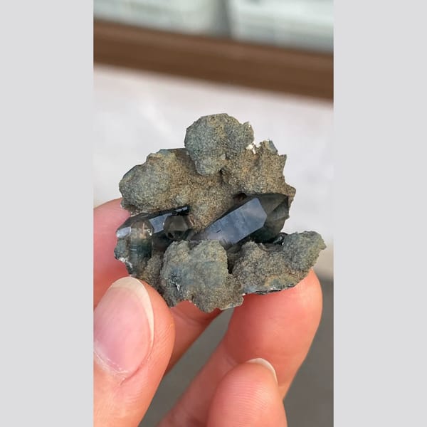 Dark blue-grey ghost quartz cluster from Namibia — detail view