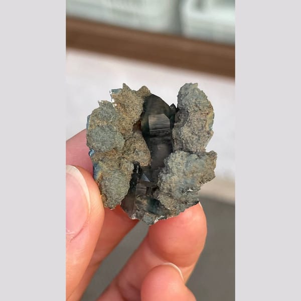 Dark blue-grey ghost quartz cluster from Namibia — detail view